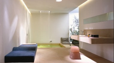 View of a large bathroom, large white tiled architecture, ceiling, daylighting, floor, flooring, furniture, house, interior design, lighting, lobby, product design, table, gray