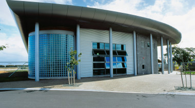 Exterior view of architectural building with blue tinted architecture, building, commercial building, corporate headquarters, facade, structure, gray, white