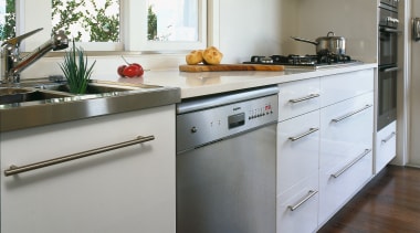 A vie wof a kitchen area, wooden flooring, cabinetry, countertop, cuisine classique, floor, flooring, hardwood, home appliance, interior design, kitchen, real estate, room, gray