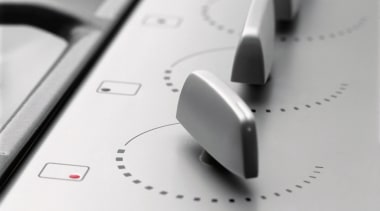 A close up view of the knobs on automotive design, font, product design, technology, white, gray