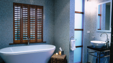 A view o a bathroom, black tiled floor, architecture, bathroom, ceiling, daylighting, floor, home, interior design, real estate, room, tile, wall, window, black