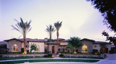 view of the mediteranean house  showing stone arecales, estate, hacienda, home, house, mansion, palm tree, property, real estate, residential area, resort, sky, tree, villa, white
