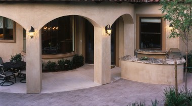 view of the clay tile roofing on this backyard, estate, facade, hacienda, home, house, outdoor structure, property, real estate, residential area, roof, window, black, white