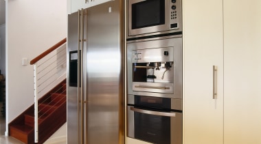 view of this kitchen featuring kleenmaid fridge,oven, microwave countertop, home appliance, kitchen, kitchen appliance, kitchen stove, major appliance, refrigerator, white