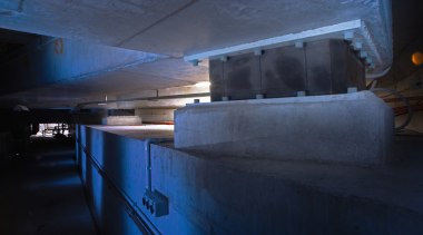 View of earthquake protection system at base of architecture, blue, darkness, light, black, blue