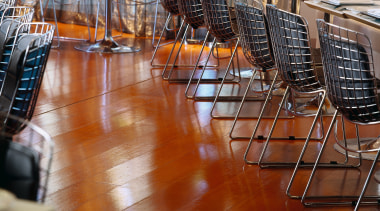 Restaurant dining area with timber flooring, chrome frame chair, floor, flooring, furniture, hardwood, interior design, laminate flooring, table, wood, wood flooring, brown