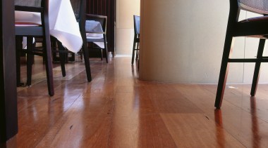 Wide timber flooring boards in restaurant dining room. chair, floor, flooring, furniture, hardwood, home, interior design, laminate flooring, living room, property, table, tile, wood, wood flooring, wood stain, brown