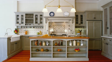 Traditional kitchen with cream cabinetry, timber island top cabinetry, countertop, cuisine classique, floor, flooring, furniture, hardwood, interior design, kitchen, room, brown, gray