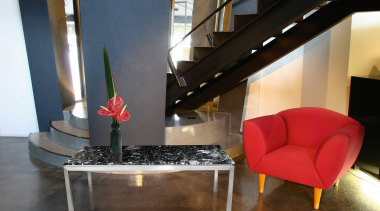 Office foyer area featuring stone and chrome coffee chair, floor, furniture, interior design, living room, loft, product design, table