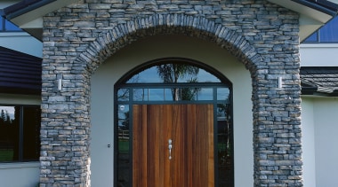 view of the house where the entrance to building, door, facade, garage door, home, house, real estate, residential area, siding, window, black