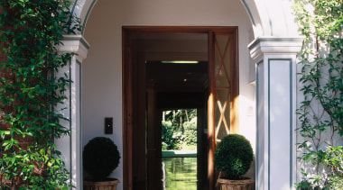 view of the formal entrance arch is indicative arch, architecture, brick, courtyard, door, estate, facade, home, house, outdoor structure, porch, real estate, structure, window, gray, black