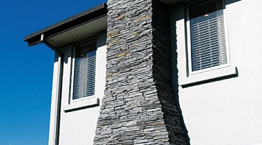 view of the stone veneers  that are architecture, building, chimney, facade, home, house, roof, sky, wall, window, blue, white