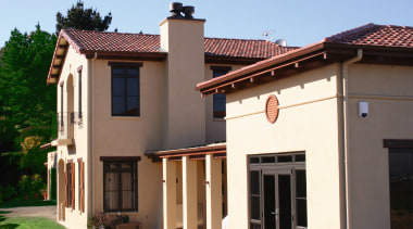 view of this expansive  mediteranean family home building, elevation, estate, facade, home, house, property, real estate, residential area, roof, siding, villa, window