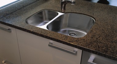 A view of a kitchen, brown benchtop and bathroom sink, countertop, kitchen, plumbing fixture, sink, tap, black, gray