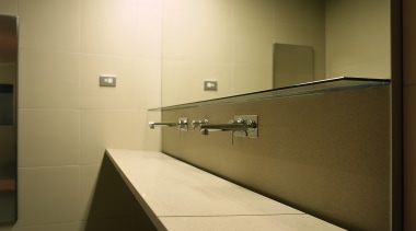 A view of the marble &amp; granite used architecture, bathroom, countertop, daylighting, floor, glass, interior design, lighting, room, sink, wall, brown, orange