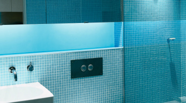 View of Toilet, Shower and faucetry in Bathroom. azure, bathroom, bidet, blue, ceiling, daylighting, floor, glass, interior design, plumbing fixture, product, product design, public toilet, purple, room, tile, toilet, toilet seat, turquoise, wall, teal