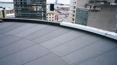 A view of the building materials used on architecture, asphalt, building, daylighting, floor, line, metropolitan area, road surface, roof, sky, urban area, gray