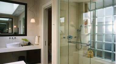 view of this bathroom featuring rnoan-nu tone stylish bathroom, glass, interior design, room, window, gray