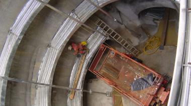 A view of some engineering work within a arch, gray