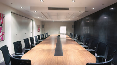 A view of the furniture used through out ceiling, conference hall, furniture, interior design, office, table, gray, black
