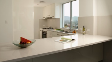A view of a kitchen area, white cabinetry architecture, countertop, cuisine classique, interior design, kitchen, product design, real estate, room, gray