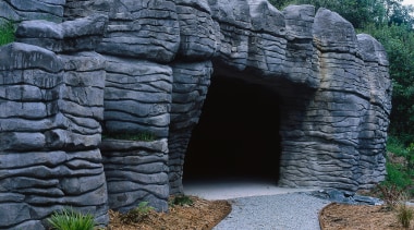 A view of the construction work performed by grass, rock, ruins, wall, black