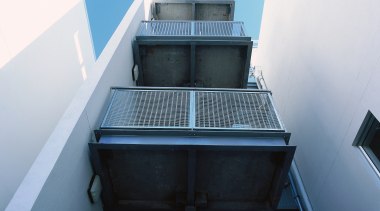 An exterior view of the steel used on architecture, building, daylighting, glass, house, stairs, white, black, teal