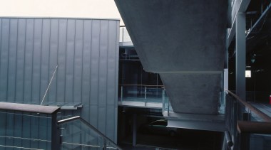 A view of the construction work. - A architecture, building, daylighting, facade, glass, house, roof, structure, black, gray