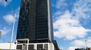 An exterior view of the Freshwater Place building architecture, building, city, commercial building, condominium, corporate headquarters, daytime, downtown, facade, headquarters, landmark, metropolis, metropolitan area, mixed use, real estate, sky, skyscraper, tower, tower block, urban area, black