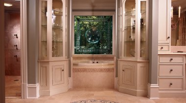 The remodled bathroom has features that branch out cabinetry, door, estate, floor, flooring, furniture, hardwood, interior design, laminate flooring, lobby, molding, window, wood flooring, wood stain, brown, orange