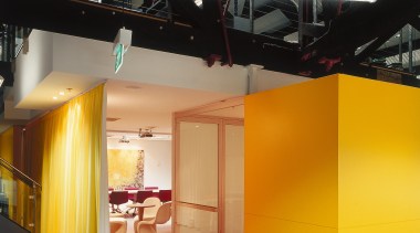 A view of a communal area. - A architecture, ceiling, interior design, product design, black, orange