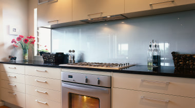 Examples of kitchens designed by Stylehouse Kitchens to cabinetry, countertop, cuisine classique, home appliance, interior design, kitchen, kitchen stove, room, under cabinet lighting, brown