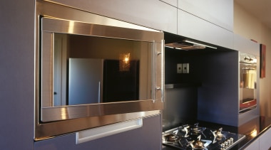 An example of the different appliances offered by cabinetry, countertop, interior design, kitchen, gray, black, brown