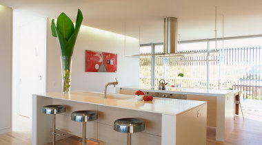 Examples of different two very different styles of architecture, countertop, interior design, kitchen, product design, table, gray, brown