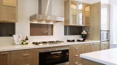 Kitchen with veneer cabinetry, large oven and cooktop, cabinetry, countertop, cuisine classique, interior design, kitchen, room, gray, brown