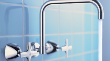 Tapware set into wall with blue tiles behind. blue, line, plumbing fixture, product, product design, tap, teal, white