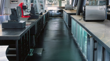 Bar and kitchen hospitality area featuring vinyl flooring. floor, black, gray