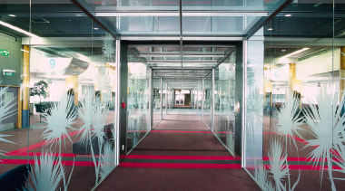 A glazed corridor at the airport terminal with architecture, ceiling, daylighting, glass, interior design, structure, black, gray