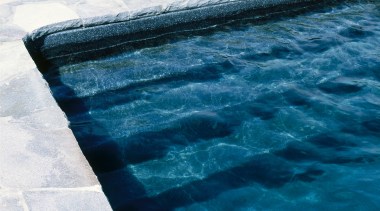 A view of a swimming pool. - A aqua, azure, blue, reflection, swimming pool, turquoise, water, water resources, teal, white