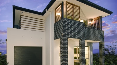 A view of a Clarendon Home. - A architecture, building, elevation, estate, facade, home, house, official residence, property, real estate, residential area, siding, blue, gray