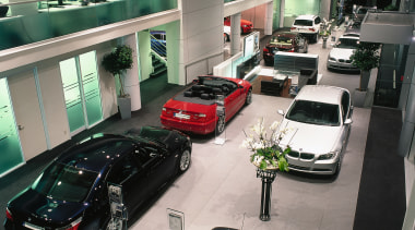 View of BMW showroom with offices on mezzanine auto show, automotive design, automotive exterior, car, car dealership, executive car, land vehicle, luxury vehicle, motor vehicle, personal luxury car, vehicle, gray, black