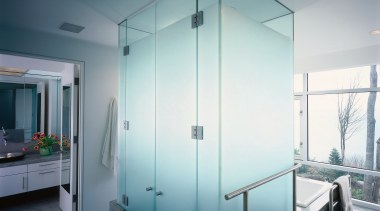 view of this bathroom featuring a large shower bathroom, door, glass, interior design, room, wall, white