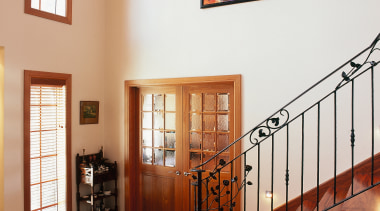 Stairway and entrance of home with natural wall baluster, estate, handrail, home, interior design, property, real estate, stairs, window, white