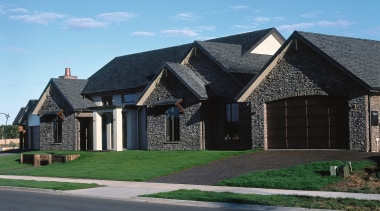 Exterior view of showhome with multi-gabled roof line building, cottage, elevation, estate, facade, farmhouse, home, house, property, real estate, residential area, roof, siding, sky, suburb, window, teal, black