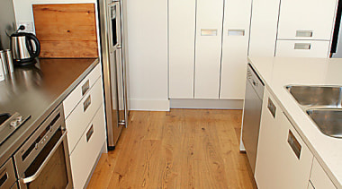 View of kitchen with timber flooring, white cabinetry cabinetry, countertop, floor, flooring, hardwood, home, interior design, kitchen, laminate flooring, room, tile, wood, wood flooring, white