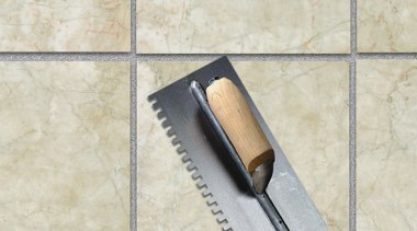 view of this bathroom featuring underfloor heating and floor, flooring, tile, white