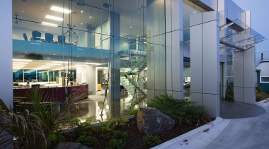 Exterior of commercial building showing extensive glazing along apartment, architecture, building, condominium, home, house, interior design, real estate, gray