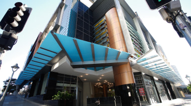 Exterior view of foyer entrance to apartment corner architecture, building, city, commercial building, condominium, facade, metropolitan area, mixed use, white, black