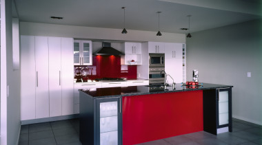 A view of a kitchen by Kitchen Focus. architecture, cabinetry, countertop, cuisine classique, interior design, kitchen, real estate, room, gray, black