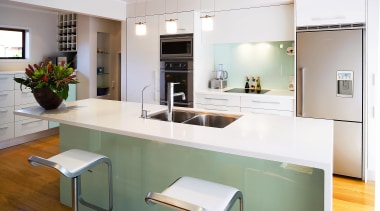 Kitchen with white Corian benchtop, bar stools and cabinetry, countertop, cuisine classique, interior design, kitchen, real estate, room, white